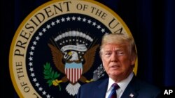 FILE - President Donald Trump arrives for a bill signing ceremony in the South Court Auditorium on the White House campus, May 30, 2018, in Washington, May 30, 2018.