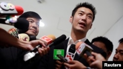 Thanathorn Juangroongruangkit, founder of Thailand's Future Forward Party, talks to journalists before leaving Technology Crime Suppression Division in Bangkok, Thailand, Sept. 17, 2018.