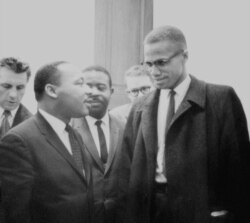 FILE - The Rev. Martin Luther King Jr., left, and Malcolm X.