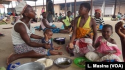 People displaced by flooding are seen at Bangula evacuation camp, in Nsanje, Malawi, March 12, 2019.