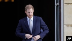 Britain's Prince Harry arrives at the gardens at Buckingham Palace in London, Jan. 16, 2020. 