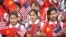 Vietnamese students hold U.S. and Vietnamese flags at a welcoming ceremony for U.S. President Barack Obama at the Presidential Palace in Hanoi, Vietnam, May 23, 2016.