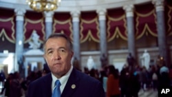 The stupa of the Buddhist temple Wat Arun (Temple of Dawn) is illuminated in green to mark St. Patrick&#39;s Day in Bangkok.