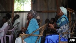 Villagers attend morning church service in the village of Kogelo in Siaya county, Kenya, July 26, 2015. Broadcasting in the Luo language, Dada Radio broadcasts on important issues for women and offers training. 