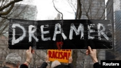 Activists and DACA recipients march up Broadway during the start of their 'Walk to Stay Home,' a five-day 250-mile walk from New York to Washington D.C., to demand that Congress pass a Clean Dream Act, in Manhattan, New York, U.S., Feb. 15, 2018. 