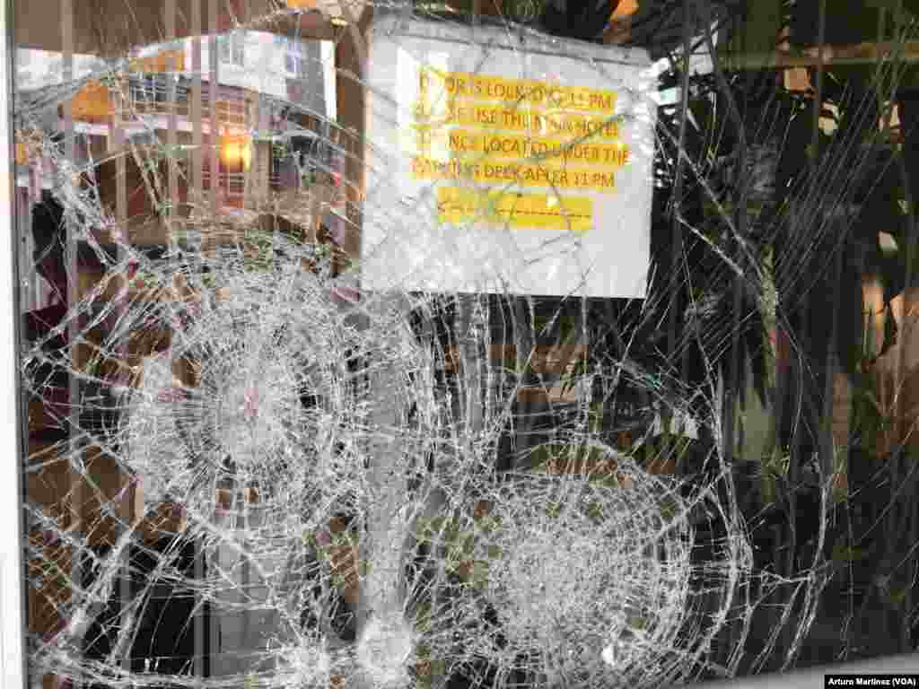 The Hilton Garden Inn is one of the many buildings that suffered broken windows as a result of Wednesday night's violent protests in Charlotte, N.C., Sept. 22, 2016.