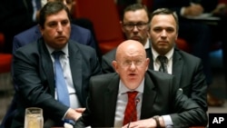 FILE - Russia's U.N. Ambassador Vassily Nebenzia addresses the United Nations Security Council, at U.N. headquarters, Monday, Sept. 17, 2018.