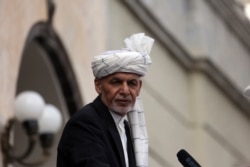 FILE - Afghan President Ashraf Ghani speaks after he was sworn in at an inauguration ceremony at the presidential palace in Kabul, March 9, 2020.