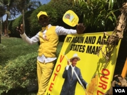 A supporter of President Yoweri Museveni at a rally in Kisaasi, a suburb of Kampala, Uganda, Feb. 16, 2016. (Photo: J. Craig / VOA )
