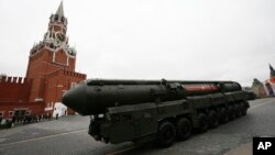 FILE - Russian Topol M intercontinental ballistic missile launcher rolls along Red Square during the Victory Day military parade to celebrate 72 years since the end of WWII. May 9, 2017. 