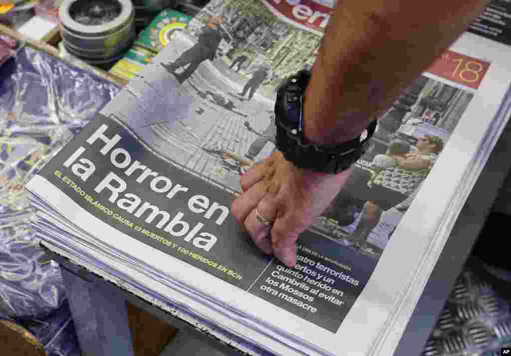 A newspaper displays a photograph of the aftermath of the terror attack in Las Ramblas, in Barcelona, Spain, Aug. 18, 2017.&nbsp;