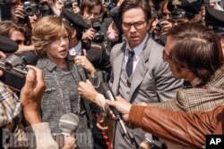 Мішель Вільямс та Марк Волберг