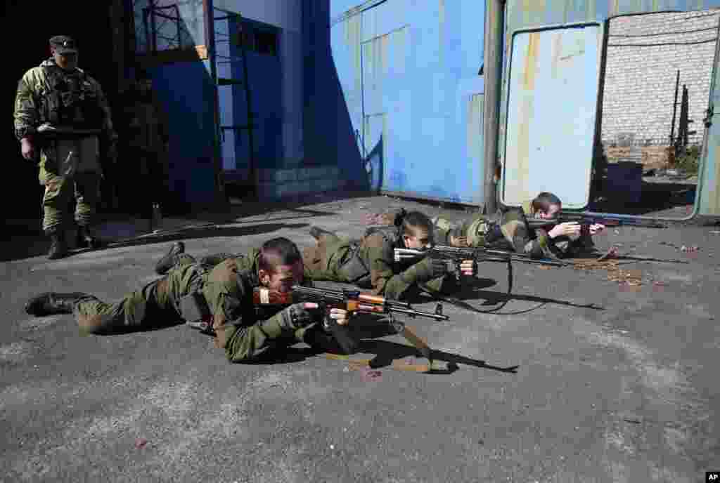 Young pro-Russian rebels train in the city of Donetsk, eastern Ukraine, Sept. 29, 2014. 