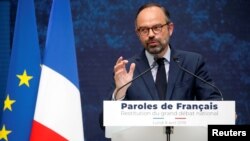 French Prime Minister Edouard Philippe delivers a speech during the presentation of the "Great National Debate" findings, called to quell the anger of French "yellow vests" movement, at the Grand Palais in Paris, France, Apr. 8, 2019. 