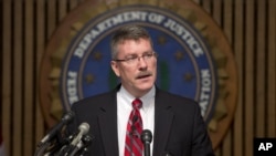 Ron Hosko, assistant director of the FBI's Criminal Investigative Division, addresses during a news conference at FBI headquarters in Washington, July 29, 2013.