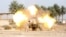 Iraqi security forces fire cannon during clashes with al Qaeda-linked Islamic State in Iraq and the Levant (ISIL), Jurf al-Sakhar, south of Baghdad, March 19, 2014.