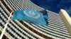 FILE - The flag of the International Atomic Energy Agency (IAEA) flies in front of its headquarters in Vienna, Austria.