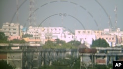 The infamous Bakara Market seen from a Burundian position in Mogadishu. Al-Shabab launches most of its mortars from the heavily populated Bakara. AMISOM forces have moved closer to the neighborhood since September and hope to capture it with the arrival o