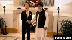 نورالدین عزیزی، وزیر صنعت و تجارت حکومت طالبان و جی شنکر، وزیر خارجه هند حین ملاقات در دهلی جدید