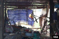 A dull-looking banner of the dissolve CNRP seen at Chek Chhun’s house in Kdey Run commune of Siem Reap province. (Sun Narin/VOA Khmer)