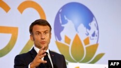 France's President Emmanuel Macron speaks during a press conference after attending the G20 summit in New Delhi on September 10, 2023.