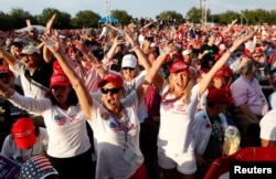 Supporters react during a campaign rally with U.S. President Donald Trump in Panama City Beach, Fla., May 8, 2019.