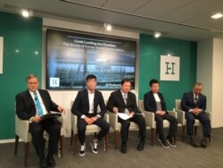 Patrick Cronin of the Hudson Institute (L) is seen with ex-North Korean soldiers in Washington, March 4, 2020. From right to left, Colonel Steve Lee, Henry Song, and Lee Unggil. One man's face is blurred to protect his identity. (Eunjung Cho/VOA)