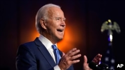 FILE - Former Vice President Joe Biden, now president-elect, speaks Nov. 6, 2020, in Wilmington, Del. 