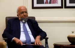 FILE - Palestinian Chief Negotiator Saeb Erekat meets with Jordanian Foreign Minister Ayman Safadi (not pictured) in Amman, Jordan, Sept. 6, 2020.