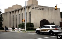 FILE - A police vehicle is seen near the Tree of Life synagogue in Pittsburgh, Pennsylvania, Oct. 29, 2018.