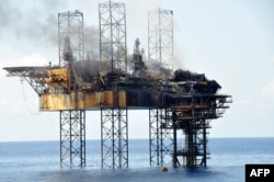 Foto yang dirilis PTTEP Australia pada 3 November tampak anjungan pengeboran minyak West Atlas dan kepala sumur Montara setelah kebocoran berhasil di atasi dan kebakaran pada kepala sumur utama dipadamkan. (Foto: AFP)