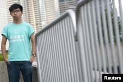 Hong Kong student leader Joshua Wong poses for a photo, a day before an appeal verdict on charges relating to 2014 pro-democracy "Umbrella Movement," also known as "Occupy Central" protests, in Hong Kong, Aug. 15, 2017.