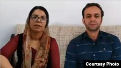 In this image composed of screen grabs from an Instagram video posted on Oct. 31, 2020, Iranian Kurdish activist married couple Farideh Veysi and Sirous Abbasi describe the apparent forced confessions they made while incarcerated in Sanandaj, Iran.
