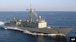 In this image provided by the U.S. Navy the guided missile frigate USS Nicholas steams through the Atlantic Ocean in formation (file photo)