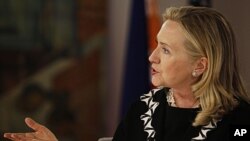 U.S. Secretary of State Hillary Rodham Clinton gestures during her townhall meeting and interview with Filipino scholars in Manila, Nov. 16, 2011.