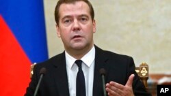 FILE - Russian Prime Minister Dmitry Medvedev during a Cabinet meeting in Moscow, Aug. 7, 2014.