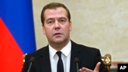 FILE - Russian Premier Dmitry Medvedev.