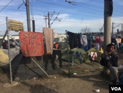 Families living in this camp in Idomeni, Greece, are genuinely confused why Europe, which largely welcomed refugees last year is now denying them entry, March 30, 2016. (Photo - H. Murdock/VOA)