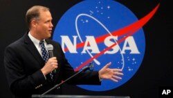 NASA Administrator James Bridenstine delivers remarks as he tours the NASA Michoud Assembly Facility in New Orleans, Monday, Aug. 13, 2018. (AP Photo/Gerald Herbert)