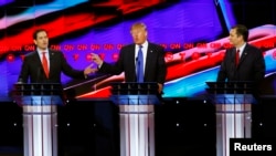 Republican U.S. presidential candidates (L-R) U.S. Senator Marco Rubio, Donald Trump and Senator Ted Cruz speak at the debate sponsored by CNN for the 2016 Republican U.S. presidential candidates in Houston, Texas, Feb. 25, 2016.