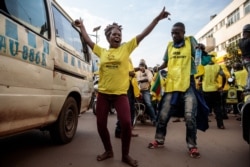 FILE - Supporters of the National Resistance Movement celebrate the victory of Yoweri Museveni in the presidential election in Kampala, Uganda, Jan. 16, 2021. Museveni won a sixth term in office.