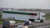 Some 150 trucks leave Manston Airfield during a 'no-deal' Brexit test for where 6,000 trucks could be parked at the airfield near Ramsgate in south east England, Jan. 7, 2019. 