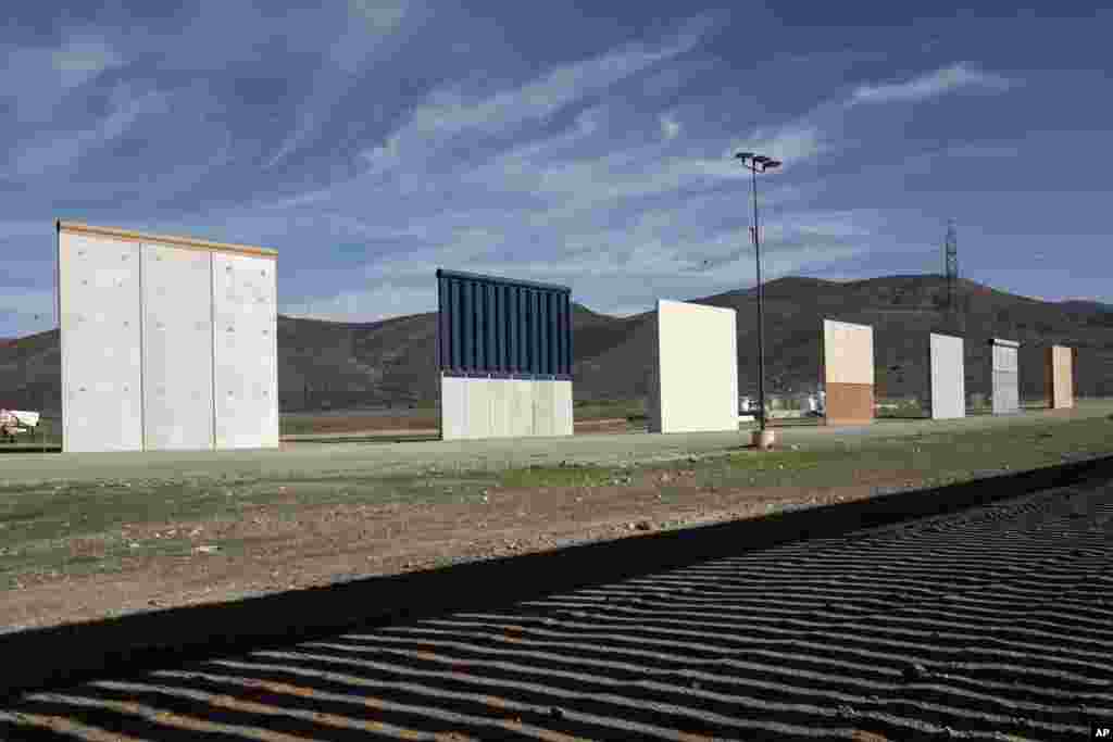 Border wall prototypes stand in San Diego near the Mexico U.S. border, seen from Tijuana, Dec. 22, 2018. The U.S. federal government remains partially closed in a protracted standoff over President Donald Trump's demand for money to build a border wall wi