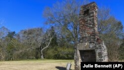 The last remaining original structure from the days when survivors of the Clotilda inhabited the area, stands in an abandoned lot in Africatown in Mobile, Ala.