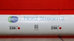 FILE - The logo of the Nord Stream 2 gas pipeline project is seen on a large diameter pipe at the Chelyabinsk Pipe Rolling Plant owned by ChelPipe Group in Chelyabinsk, Russia, Feb. 26, 2020.