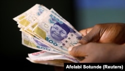 Noti za naira za Nigeria. Picha na Shirika la habari la REUTERS/Afolabi Sotunde/Maelezo /Maktaba.