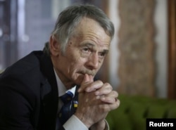 FILE - Crimean Tatars leader Mustafa Dzhemilev during an interview in Kyiv, March 15, 2014.