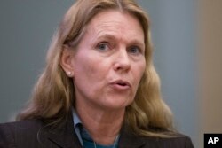 FILE - Middletown, Ohio, attorney Terri King, seeking the Republican nomination to run for Ohio's 8th District seat vacated by former U.S. House Speaker John Boehner, speaks during a forum at the Miami University learning center in West Chester, Ohio.