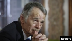 FILE - Crimean Tatar leader Mustafa Dzhemilev is seen during an interview in Kyiv, Ukraine, March 15, 2014. 