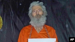 File - Undated handout photo provided by the family of Robert Levinson shows retired-FBI agent, who went missing on the Iranian island of Kish in March 2007.